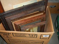 A box of old wooden frames etc