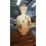 A Victorian hand painted stoneware vase