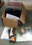 A box of LP records including Johnny Mathis, The Shadows & Classical music etc.