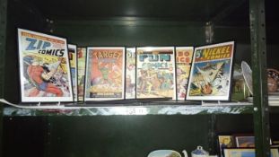 A quantity of framed & glazed comic covers