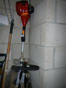 A petrol strimmer