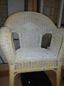 A wicker bedroom chair