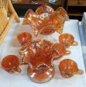 8 pieces of carnival glass including large bowl etc.