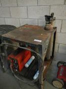 A metal bench incorporating welder