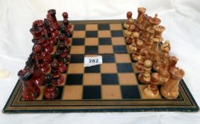 A chess set with marble effect resin pieces