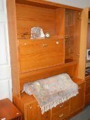 A drop front cabinet