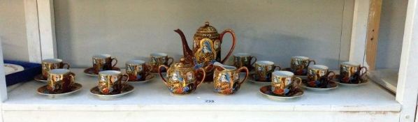 A 12 piece Japanese tea set including teapot,