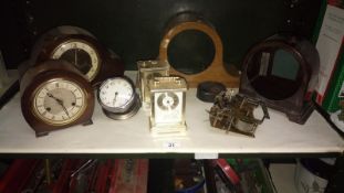 A quantity of clocks including mantle clocks & mantle clock cases