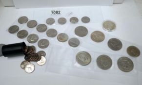 A collection of USA one dollar coins including 1880, 1921,