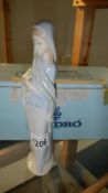 A Lladro figure of Girl with Flowers in original box