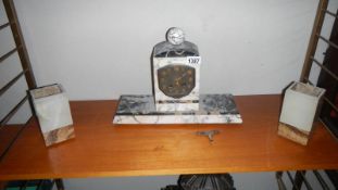 A 3 piece Art Deco style clock garniture set ( springs ok,