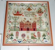 A framed & glazed sampler