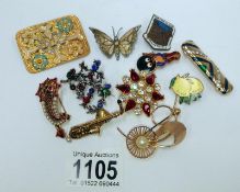 10 mixed brooches