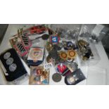 A quantity of cloth badges, buttons,