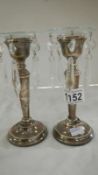 A pair of hallmarked candlesticks