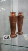 A pair of Art Nouveau copper vases