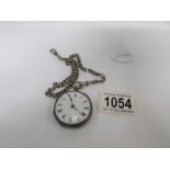 A silver pocket watch on chain