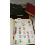 A box of 4 stamps albums