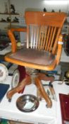 A vintage swivel office chair