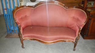 A mahogany framed two seater settee