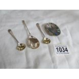 3 silver spoons and a white metal buckle set paua shell