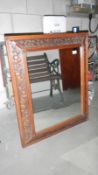 An arts & crafts style mirror