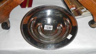 A silverplate collecting dish