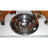 A silverplate collecting dish