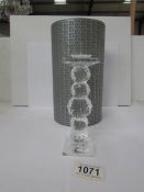 A Swarovski candleholder,