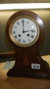 An Edwardian inlaid mahogany 8 day balloon clock in working order