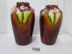 A pair of fine porcelain floral decorated vases