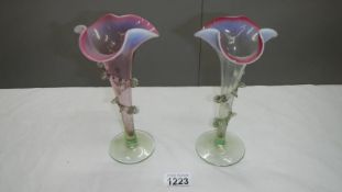 A pair of Victorian overlaid Cranberry glass epergne spill vases