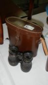 Two pair of binoculars,