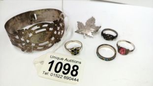 4 silver rings,