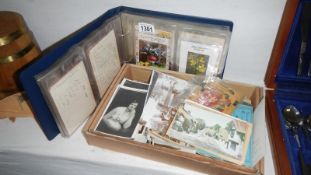 A box of postcards 1906 to date and album of postcards 1906 to date