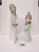 2 Lladro figures being a girl with a cat and a girl with a candle