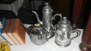 A silverplate matching tea and coffee pot and a Kings Pattern teapot