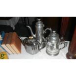 A silverplate matching tea and coffee pot and a Kings Pattern teapot