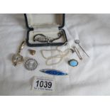 A mixed lot of jewellery including lovers pendant, silver and enamel brooch,