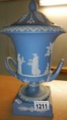 A Wedgwood Jasperware blue urn with lid