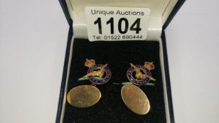 A pair of RAF wartime cufflinks featuring the Kings crown