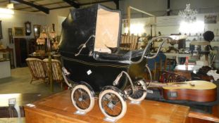 An old dolls pram