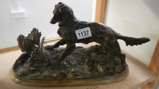 A bronze figure of a retriever gun dog A/F