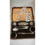 A part silver manicure set , set of six spoons,