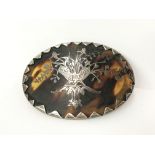 A tortoiseshell brooch