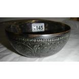 An old patinated brass bowl with Eastern decoration