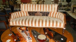 A mahogany framed two seater settee with inlaid decoration