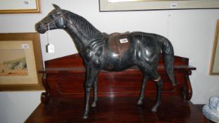 A large leather horse a/f