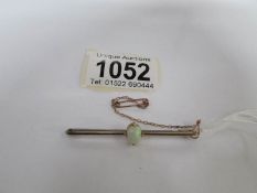 A 9ct gold and opal bar brooch
