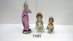 2 early 20th century foreign porcelain pin cushion dolls & a continental figurine tennis player
